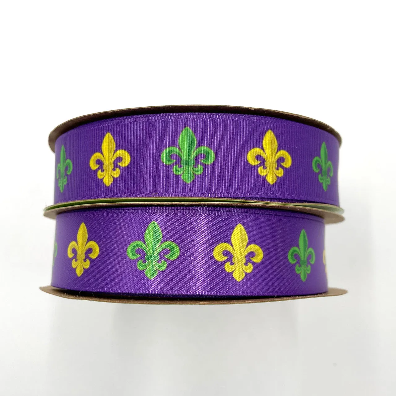 Mardi Gras ribbon with French fleur de lIs in green and yellow on a purple background printed on 7/8" white grosgrain and satin