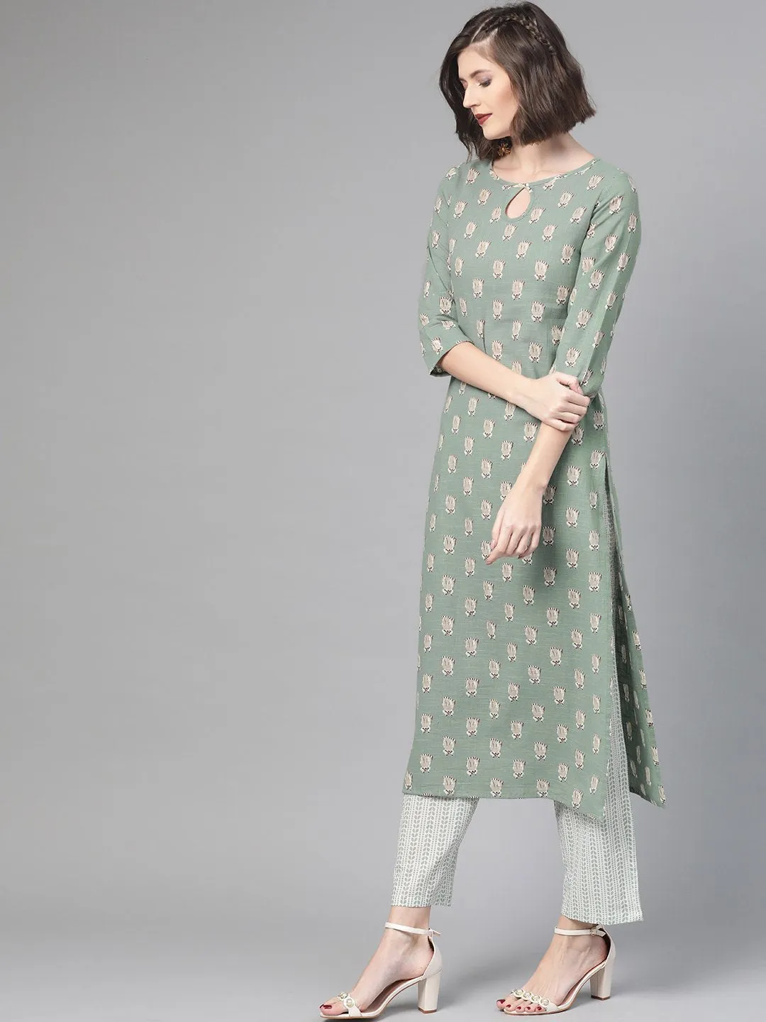 Women Green & Beige Straight Quirky Printed Kurta And Trousers Set