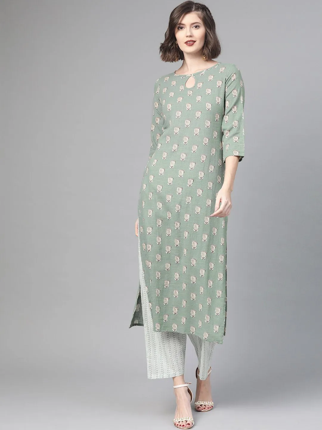 Women Green & Beige Straight Quirky Printed Kurta And Trousers Set